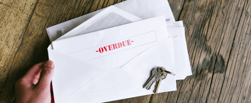 a letter in an envelope about overdue mortgage repayments